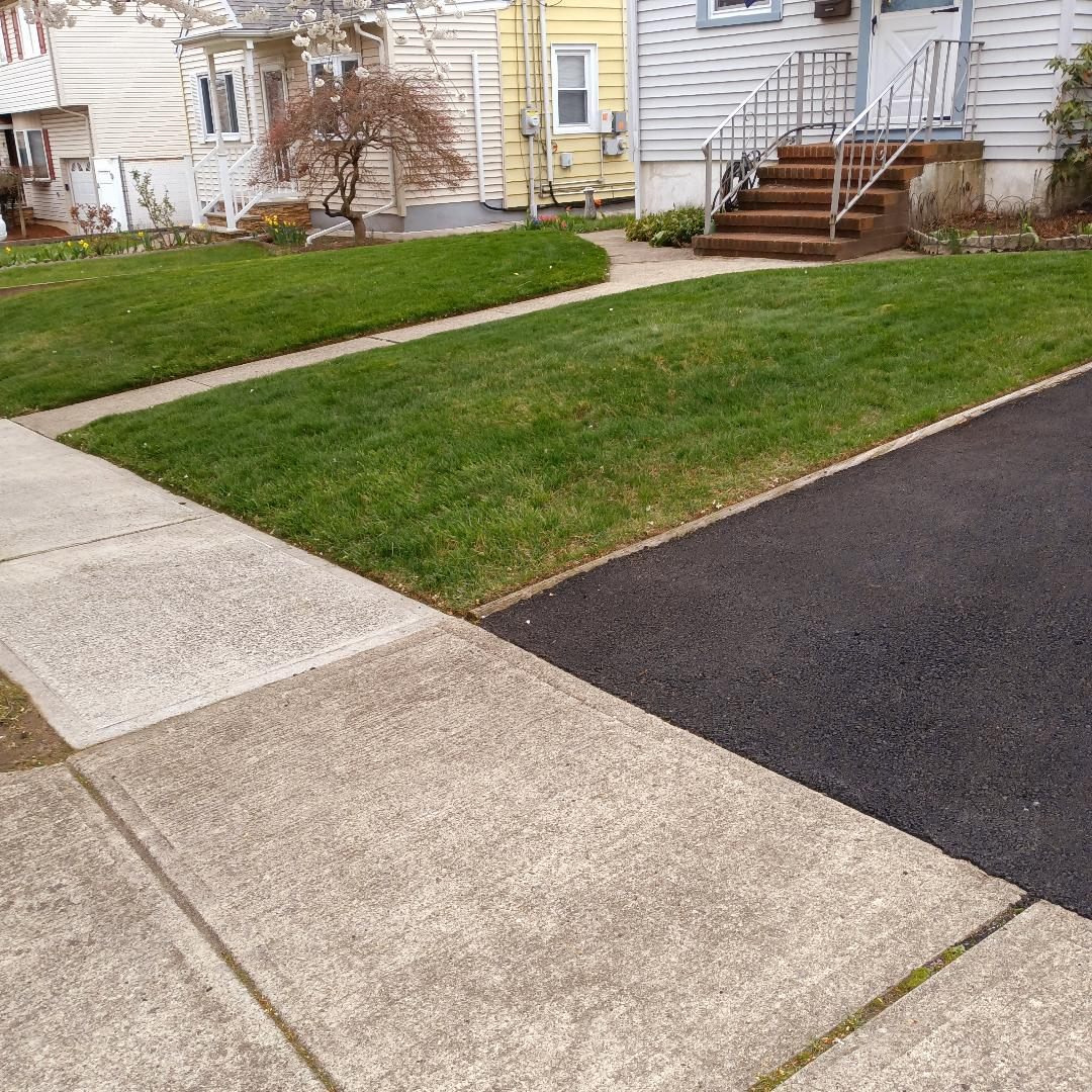 Crisp lawn edges along driveway and walkway